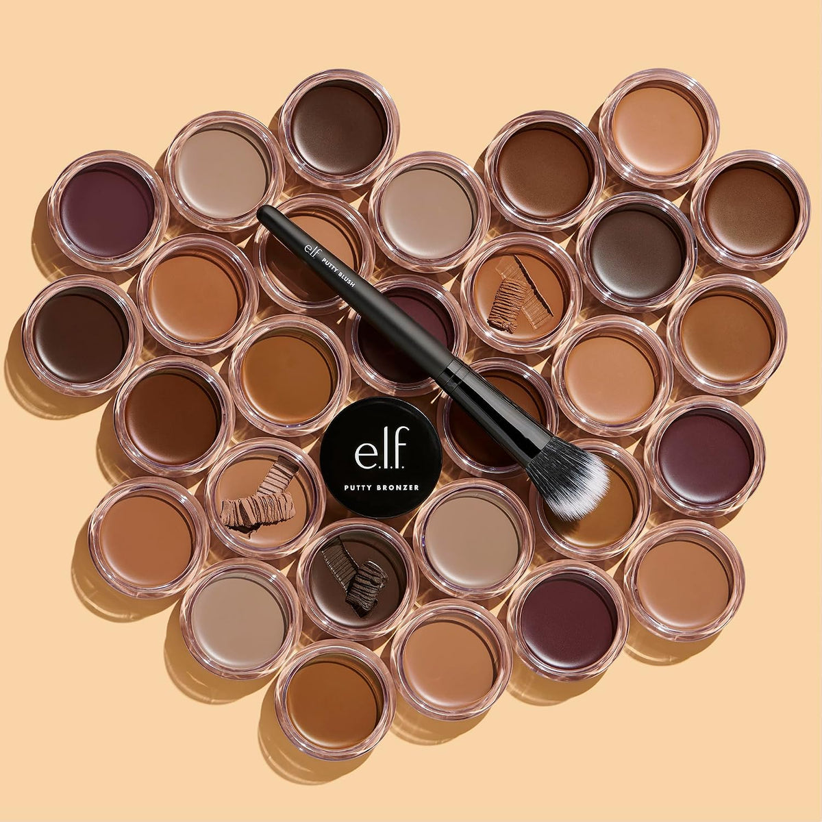 e.l.f. Putty Bronzer. Creamy & Highly Pigmented Formula. Creates a Long-Lasting Bronzed Glow. Infused with Argan Oil & Vitamin E. Tan Lines. 0.35 Oz